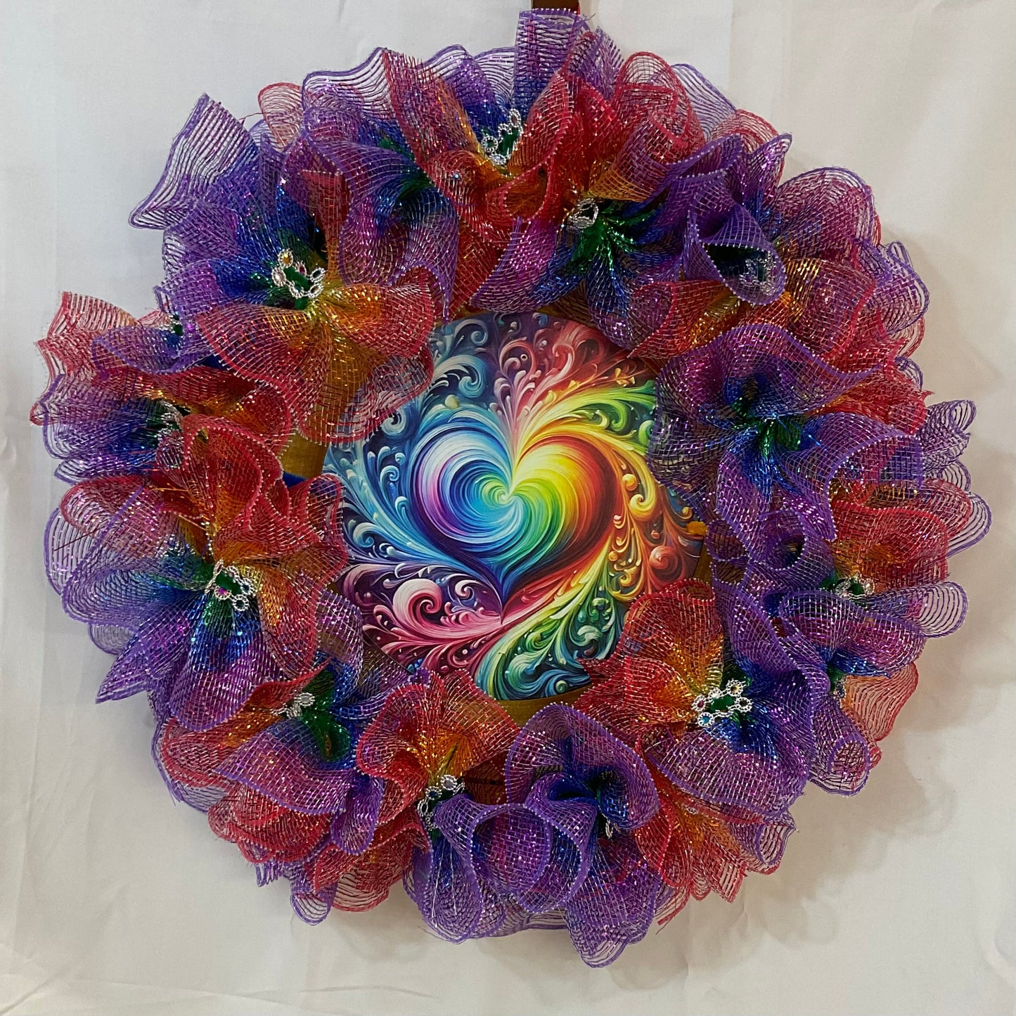 Radiant Swirl Pride Wreath with Rainbow Heart Center