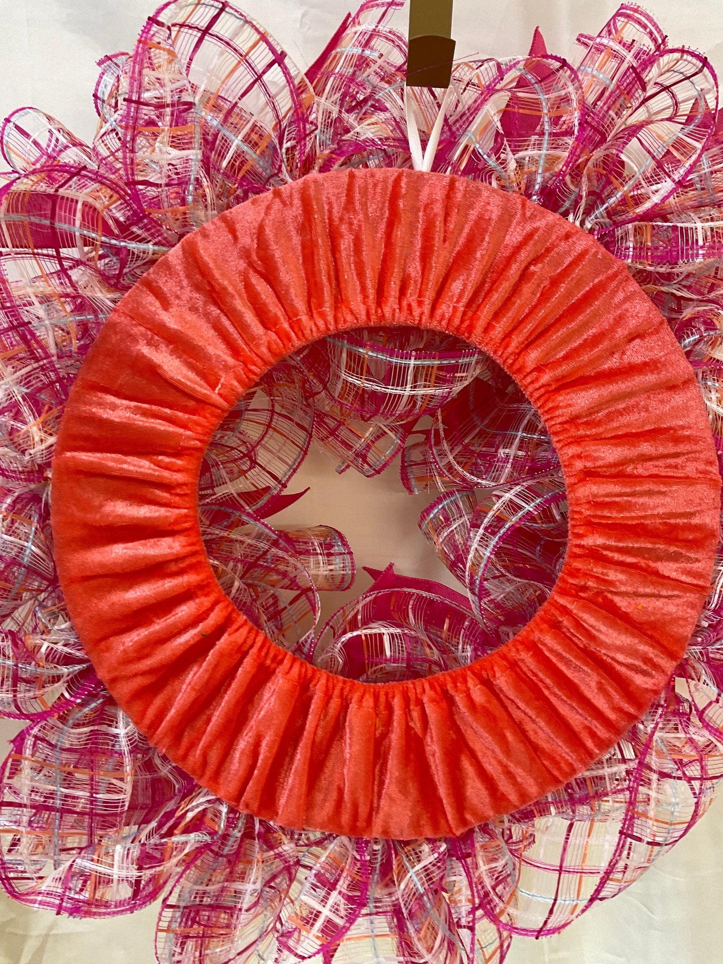 “Petals of Pride: A Wreath Where Love Always Wins”